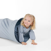 Ocean@little girl playing in tunnel