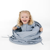 Ocean@little girl playing in tunnel